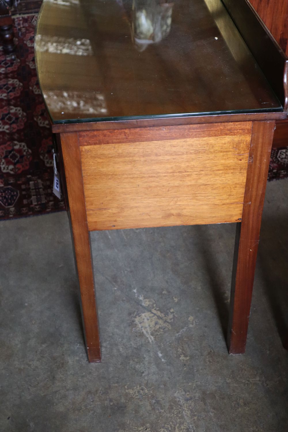 A Regency style mahogany bow-fronted dressing table, width 94cm depth 48cm height 74cm